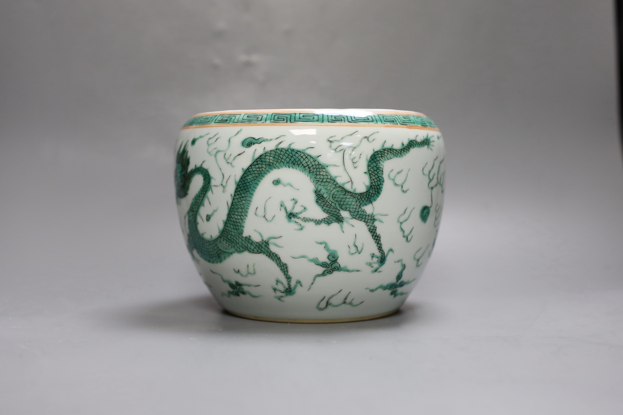 A Chinese famille verte dragon jardiniere, 14.5cm tall